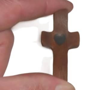 Holding Small Wooden Cross Front View